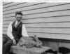 1920s_bespeckled__vested_man_and_large_rabbit.jpg