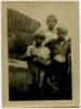 1930s_four_farm_kids_with_rabbit.jpg