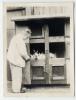 1940s-man with hutch full of flopsies