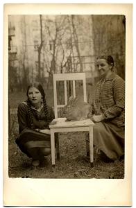 1920s-austere women with rabbit on a chair